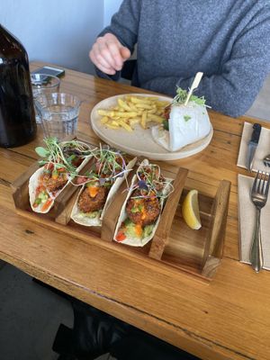 Bao burger and crispy cauliflower tacos  at Madem Espresso in Wangaratta
