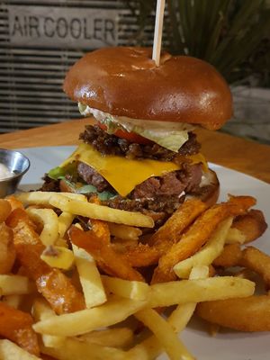 Beyond Beef sloppy Joe on top of a Redefine Meat burger. 😲 at Hativonit J17 in Tel Aviv