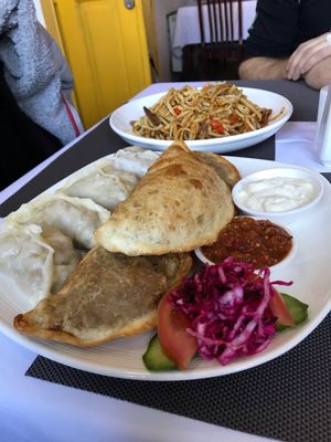 Traditional plate and noodles at Bilig Vegan Bistro in Ulaanbaatar