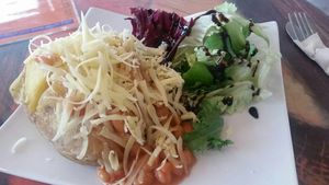 Vegan cheese & beans on a jacket potato at Cadwaladers - Mermaid Quay in Cardiff