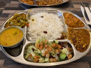 A selection of delicious vegan curries, salad, rice and a dal soup. The bean curry was wonderful.  at Aahaar Indian Cuisine in Antwerpen