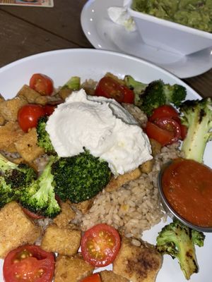 Big Italy bowl. Plant based almond ricotta. Lentil bites for protein and brown rice. at CALI - South in Tampa