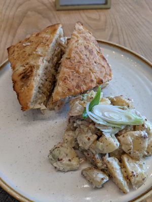 Tempeh Reuben and side of Potato Salad at Kind Cafe in Vancouver