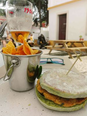 Veggie burger (chickpea and curry) in spinach bread at Avocado in Obidos