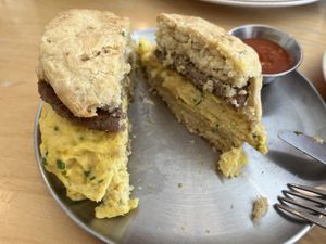 Sausage egg & cheese biscuit with spicy sauce  at Project Coffee - Burns Court in Sarasota