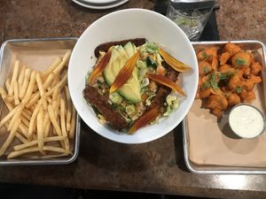 Fríes, tempeh bacon avocado summer chopped salad and cauliflower bites! at Craft Roots  in Morgan Hill