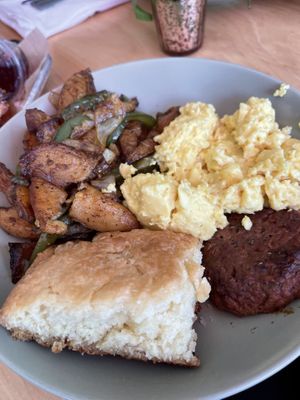 Biscuit, scrambled Just Egg, Creole potatoes, sausage = Papa’s Breakfast Bowl  at SweetArt in St Louis