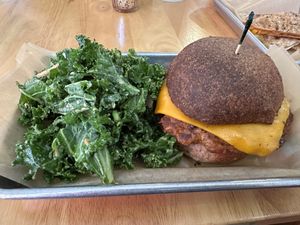 Traditional burger with kale salad  at SweetArt in St Louis