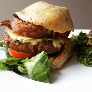 Southwest burger (vegan) onion ring on top of the patty! at SweetArt in St Louis