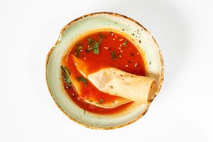 Tomato soup with cotton cheese and traditional bread Papad at Ayurveda in St Petersburg