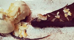 Vegan chocolate and coconut tart with vanilla ice cream at Kingfisher in East London