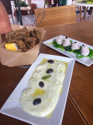 Tzatziki, Mushroom calamari and ‘fish roe’ dip with wakame at Let's Vegan in Crete