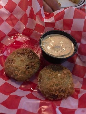 Starter of fried green tomatoes with mustard sauce. at Sticky Lips BBQ in Rochester