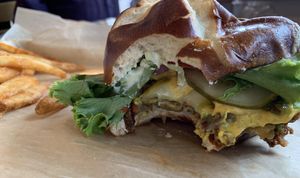 Black bean burger on a pretzel bun! at Civilian Brewing Corps in Spencer