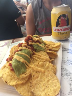 Nachos with guacamole, vegan bolognese & cheese sauce. at Las Niñas Veganas in Cadiz