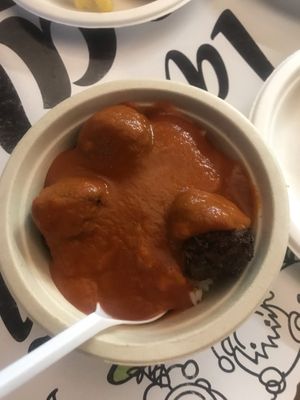 Aubergine balls in tomato sauce over rice; tasted cheesy too at Las Niñas Veganas in Cadiz