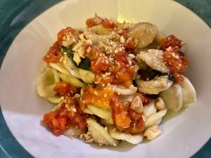 Orecchiette with smoked eggplant cream, mint, roasted red peppers, and toasted almonds.  at Munz Munz in Monopoli