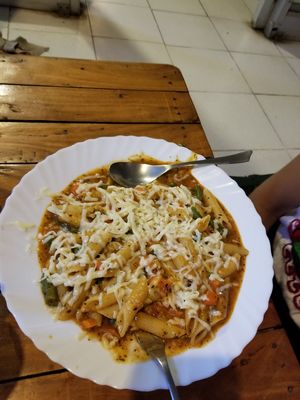 Pasta with vegetables (if you're vegan, specify no cheese) at Hungry Yogi Health Cafe in Rishikesh
