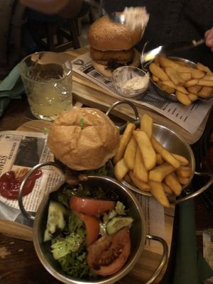 Vegan mini burger and regular veggie burger. Vegan burger comes with a mixed salad instead of cole slaw. at Flann O'Brien in Graz