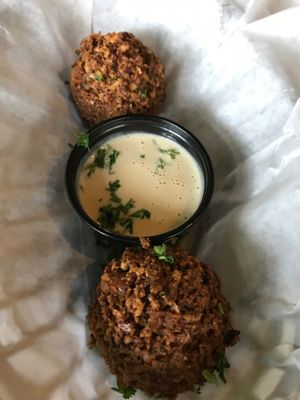 Two felafel with tarator sauce. Crispy outside, soft and tasty on the inside.  at Mooney's Mediterranean Cafe in Winston-salem