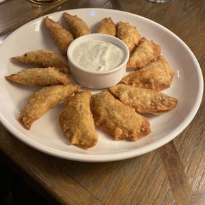 Fried Dumplings w Tofu, spicy paprika's paste, garlic and parsley served with vegan mayonnaise  at Pierogarnia Mandu Centrum in Gdansk