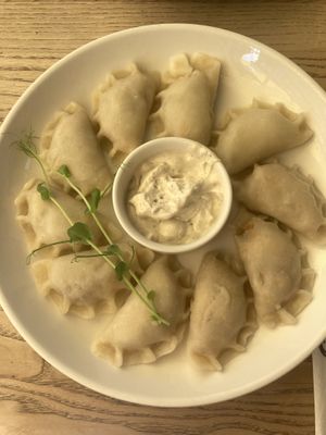 Dumplings with soy meat, pickles, mayonnaise etcc  at Pierogarnia Mandu Centrum in Gdansk