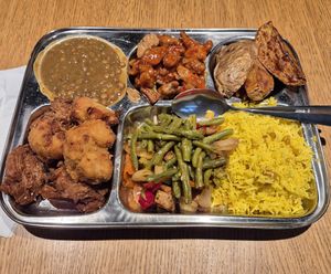 A loaded tray of food at Dhaba Beas - Lucerna in Prague