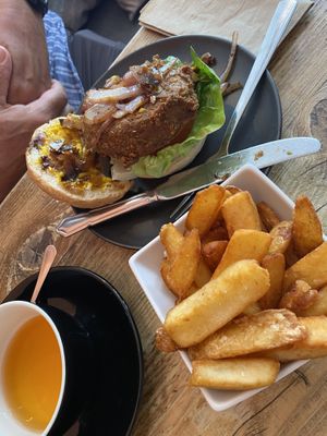 Vegan burger and side of chunky chips at PEACH in Newport