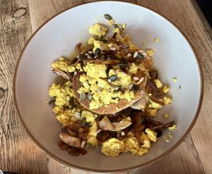Banana buckwheat pancakes with scrambled tofu and coconut.   at PEACH in Newport