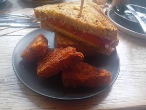 Pesto Breakfast Sandwich and 3 Hash browns at PEACH in Newport