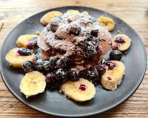 Pancakes with blueberries and bananas at PEACH in Newport