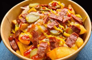 Dirty fries with bac'n, gherkins, mustard and ketchup at PEACH in Newport