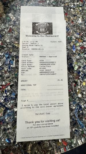 When I received the bill it looked like this. Not very obvious that there was already an 18% tip included.  at LAX - Barney's Beanery - T2 in Los Angeles