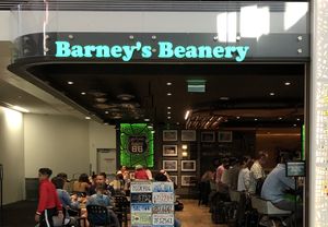 First restaurant one the left after you get through the TSA checkpoint.  at LAX - Barney's Beanery - T2 in Los Angeles