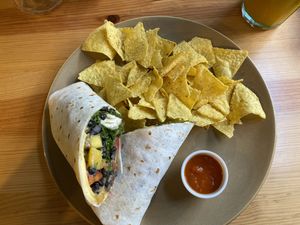 Burrito with mango, beans and tortilla chips at Kind Kitchen in Porto