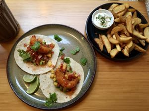 “Fish” tacos and potato wedges!  at Kind Kitchen in Porto