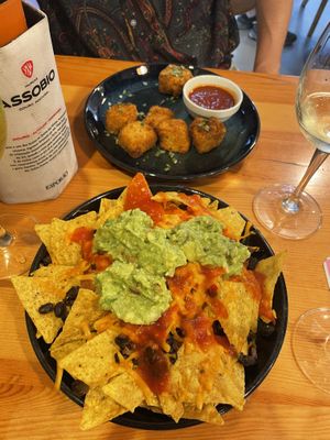 The nachos and the tofu nuggets are SO GOOD!  at Kind Kitchen in Porto