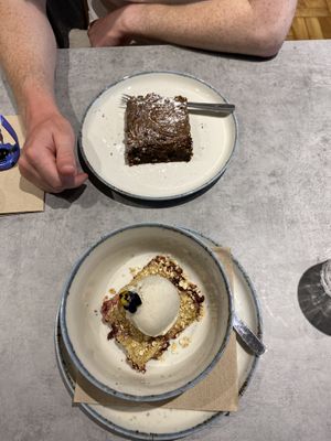 peanut butter and chocolate brownie, berry crumble with ice cream  at Kind Kitchen in Porto
