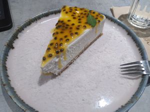 Cheesecake with passion fruit at Kind Kitchen in Porto