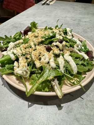 Spring greens with a whipped feta dressing. 🔥  at Kind Kitchen in Porto