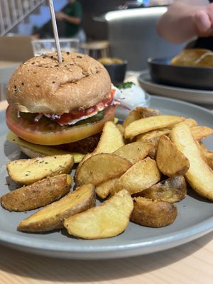 Crispy sietan and bacon burgerr  at Kind Kitchen in Porto