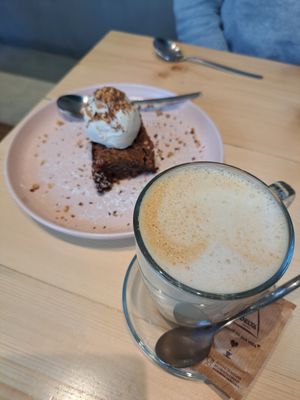 Brownie with coffee latte at Kind Kitchen in Porto