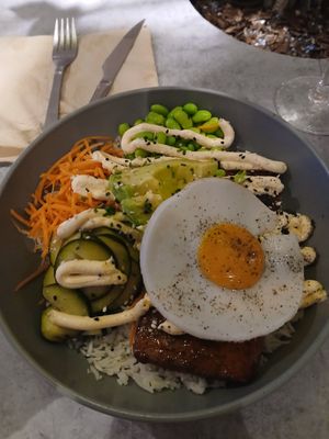 Salmon bowl with added extra egg at Kind Kitchen in Porto