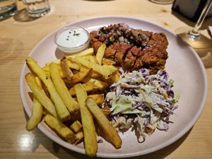 Homemade seitan steak, chimichurri sauce. at Kind Kitchen in Porto