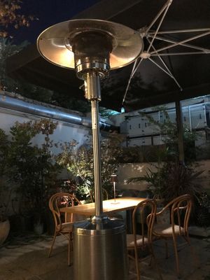 Heat lamps in the garden at TeDuKtu in Tirana