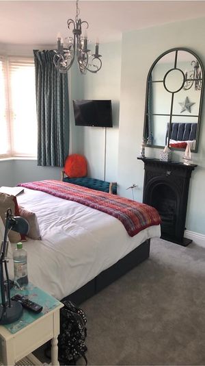 Large room has en-suite shower room at Weymouth Vegan B&B in Weymouth