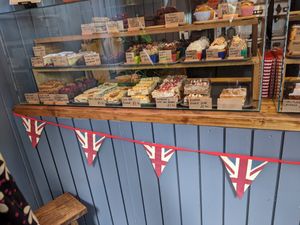 Vegan options on the left side and top row of the case at The Cuppie Hut in Norwich