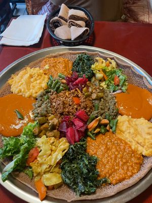 Full Habesha Plant-Based Beef Vegan Combo + extra side of injera.  at Habesha Cafe in Seattle