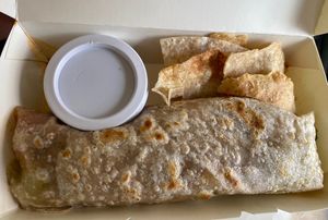 Small vegan burrito to go (salsa is in the container)  at Ima's Vegetarian Restaurant in Puerto Princesa