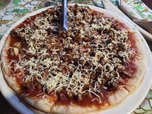 Vegetarian pizza with tempeh at Ima's Vegetarian Restaurant in Puerto Princesa